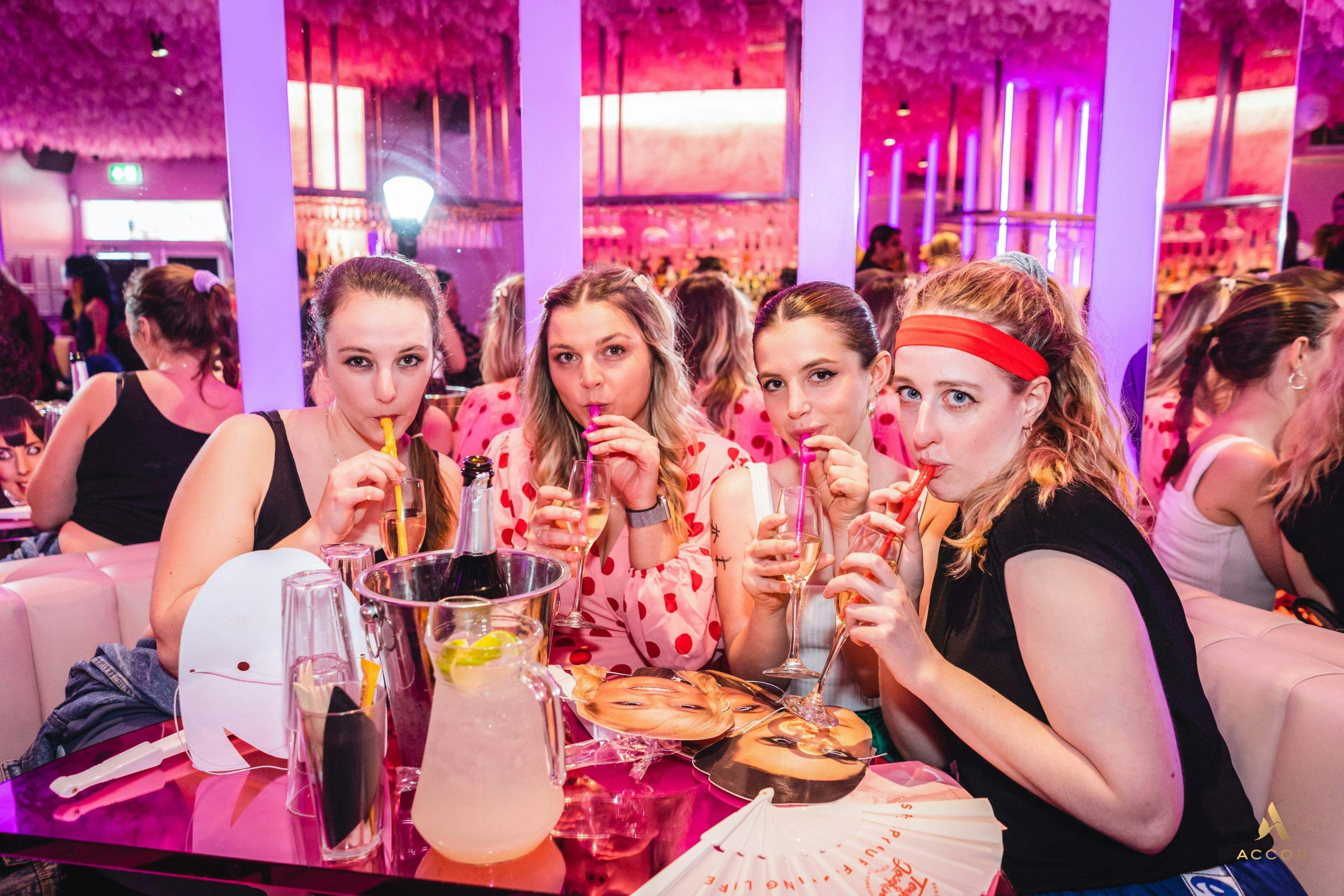 Four women enjoying cocktails at a Tonight Josephine Bar