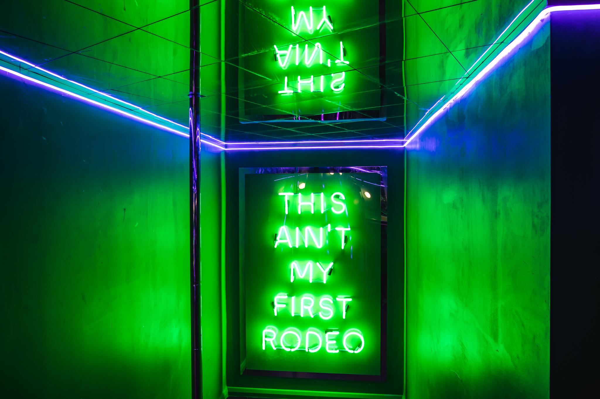 This Ain't My First Rodeo green neon sign 