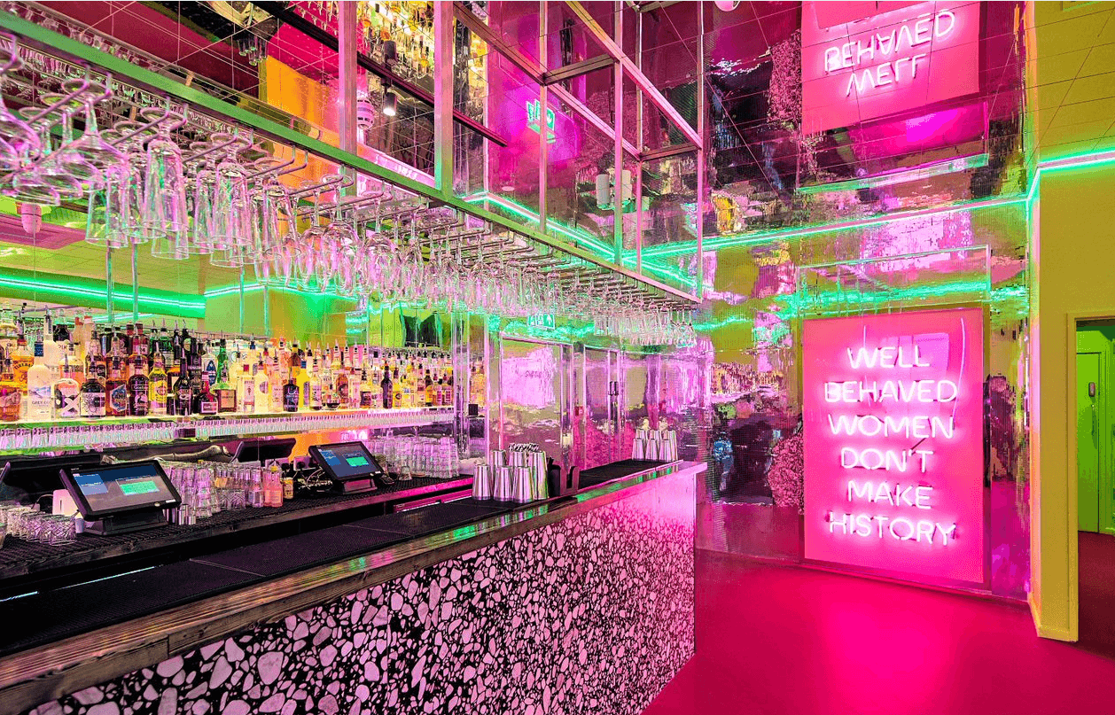 A terrazzo bar and pink neon sign in Tonight Josephine Cardiff